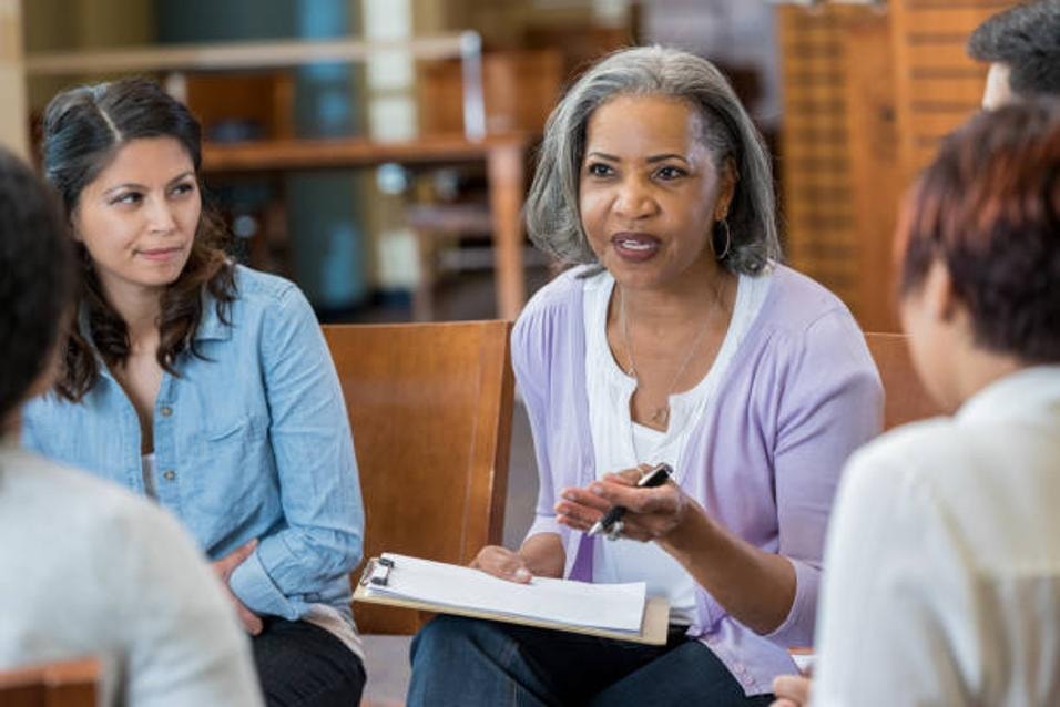Provider discussing insurance and payment options with patients